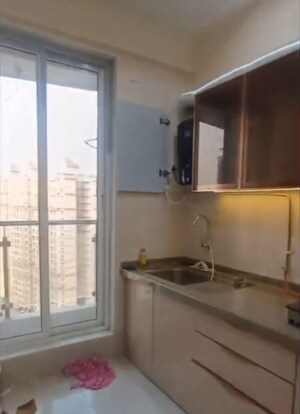 Kitchen in 2.5 BHK Apartment at Bhimjyani Verraton, Manpada – for Rent