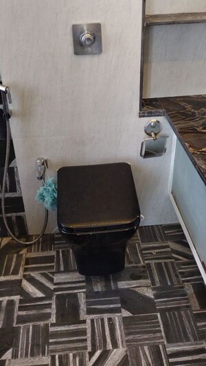 Bathroom in 2 BHK Apartment at Omkar Alta Monte, Malad East – for Rent