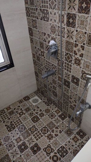 Bathroom in 2 BHK Apartment at Omkar Alta Monte, Malad East – for Rent