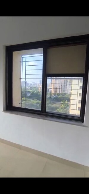 Room in 2 BHK Apartment at K Raheja Palm Court, Malad West – for Sale