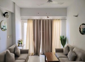 Living Room in 1 BHK Apartment at Earthcon Casa Grande, Chi V Greater Noida – for Rent