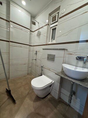 Bathroom in 4 BHK Apartment at Chattarpur – for Rent