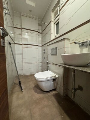 Bathroom in 4 BHK Apartment at Chattarpur – for Rent