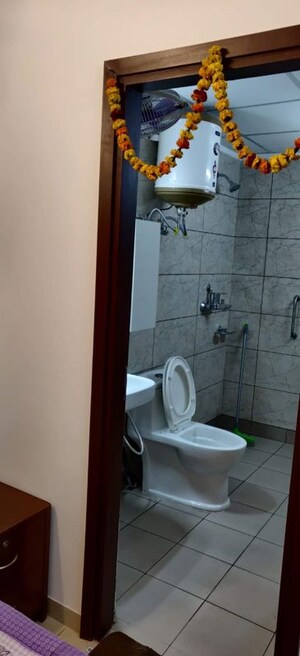 Bathroom in 2 BHK Apartment at Gulshan Botnia, Sector 144 – for Rent