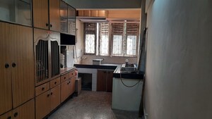 Kitchen in 2 BHK Apartment at Anuprita CHS, Andheri West – for Sale
