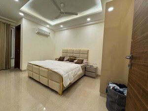 Living Room in 4 BHK Apartment at Chattarpur – for Sale
