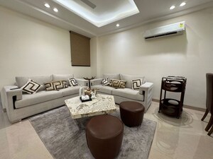 Living Room in 4 BHK Apartment at Chattarpur – for Sale