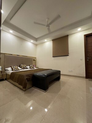 Living Room in 4 BHK Apartment at Chattarpur – for Sale