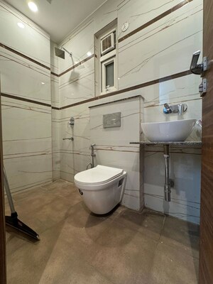 Bathroom in 4 BHK Apartment at Chattarpur – for Sale