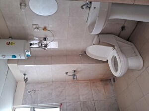 Bathroom in 2 BHK Apartment at Mittal Rajnagar Residency, Raj Nagar Extension – for Rent