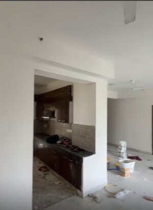 Kitchen in 3.5 BHK Apartment at Nimbus The Golden Palm, Sector 168 – for Rent