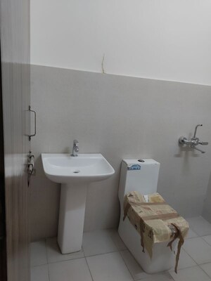 Bathroom in 2 BHK Apartment at Adore Happy Homes Grand, Sector 85 – for Sale