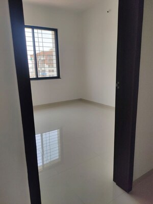 Room in 2 BHK Apartment at Royal Ishana, Thergaon – for Rent