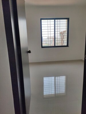 Room in 2 BHK Apartment at Royal Ishana, Thergaon – for Rent
