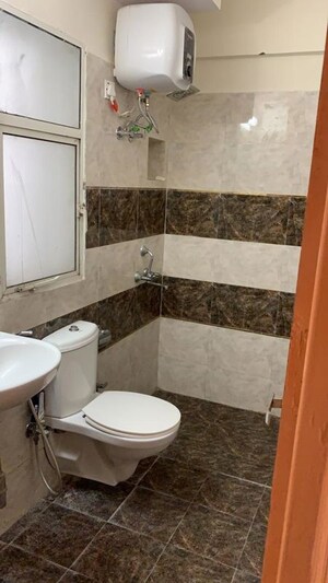 Bathroom in 3 BHK Builder Floor at Motorola Excellence Centre, Sector 14 – for Rent