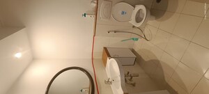 Bathroom in 5 BHK Apartment at Eros Royale Retreat II, Charmwood Village – for Rent