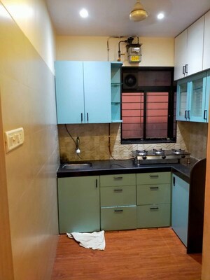 Kitchen in 1 BHK Apartment at Amrutdhara CHS, Kharghar – for Rent