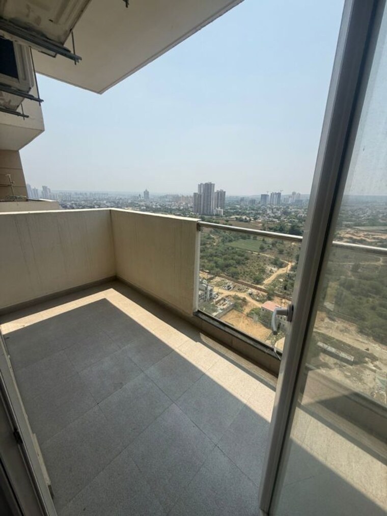 Balcony, tulip-yellow 1 Bedroom 500 Sq.Ft. Apartment In Sector 69 Gurgaon 10370986