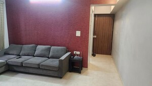 Living Room in 2 BHK Apartment at Lodha Amara, Kolshet Road – for Sale