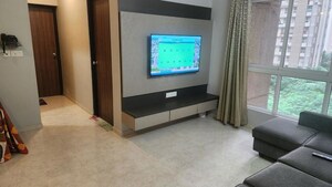 Living Room in 2 BHK Apartment at Lodha Amara, Kolshet Road – for Sale