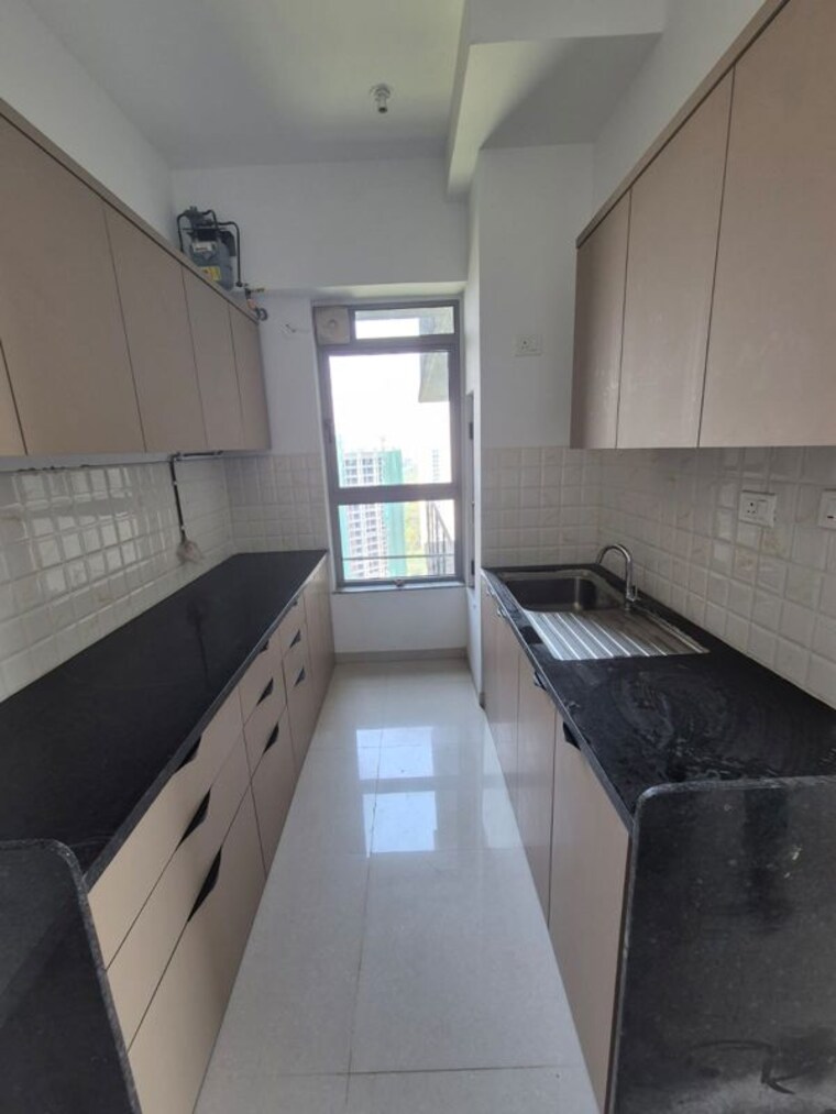 Kitchen, kalpataru-immensa-b 2 Bedroom 598 Sq.Ft. Apartment In Kolshet Road Thane 10371077