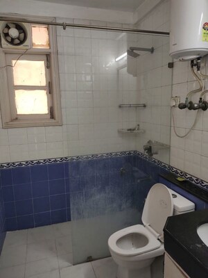 Bathroom in 3 BHK Apartment at Eros Woodbury Tower, Charmwood Village – for Sale