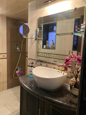 Bathroom in 1 BHK Apartment at Lokhandwala Complex – for Rent
