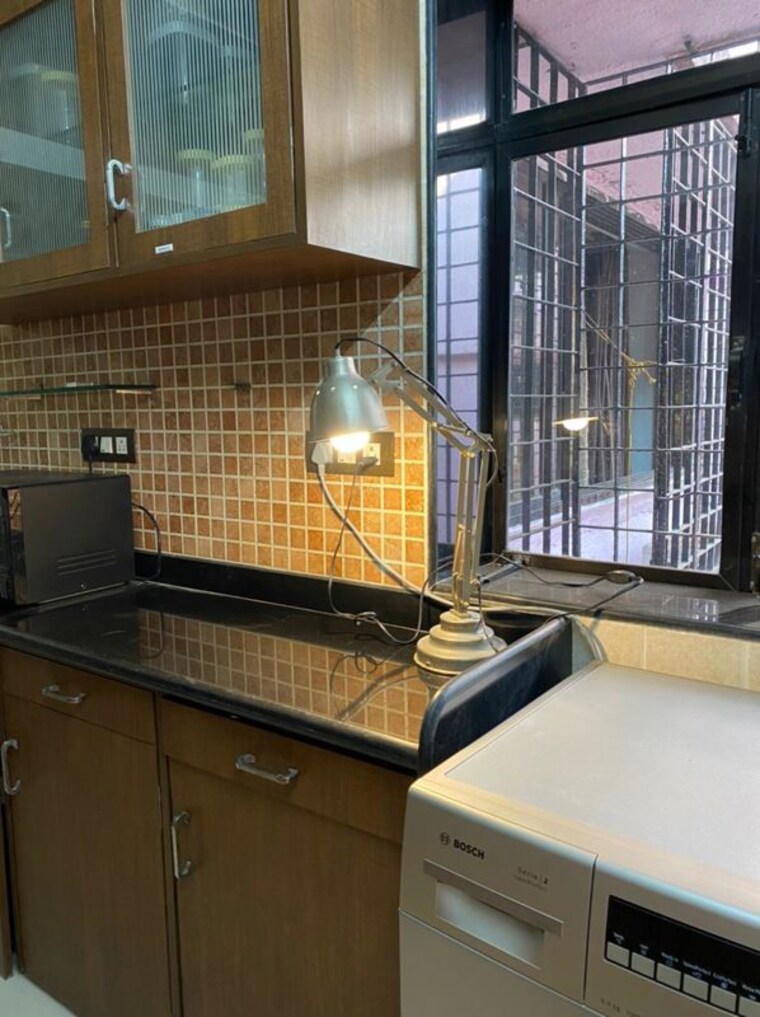 Kitchen, lokhandwala complex 1 Bedroom 600 Sq.Ft. Apartment In Lokhandwala Complex Mumbai 10371290