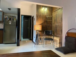 Living Room in 1 BHK Apartment at Lokhandwala Complex – for Rent