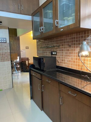 Kitchen in 1 BHK Apartment at Lokhandwala Complex – for Rent