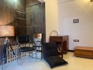 Living Room in 1 BHK Apartment at Lokhandwala Complex – for Rent