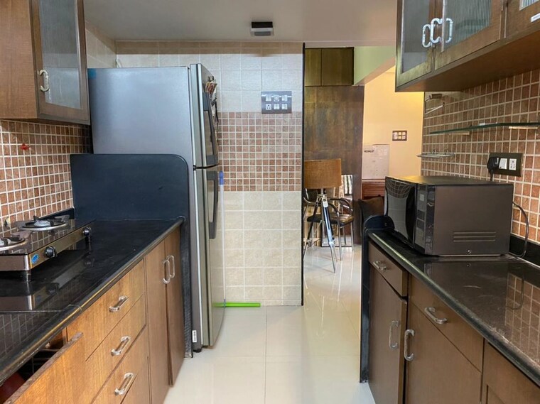 Kitchen, lokhandwala complex 1 Bedroom 600 Sq.Ft. Apartment In Lokhandwala Complex Mumbai 10371290