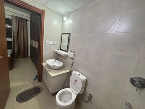 Bathroom in 2 BHK Apartment at Bhartiya Nikoo Homes, Thanisandra Main Road – for Rent
