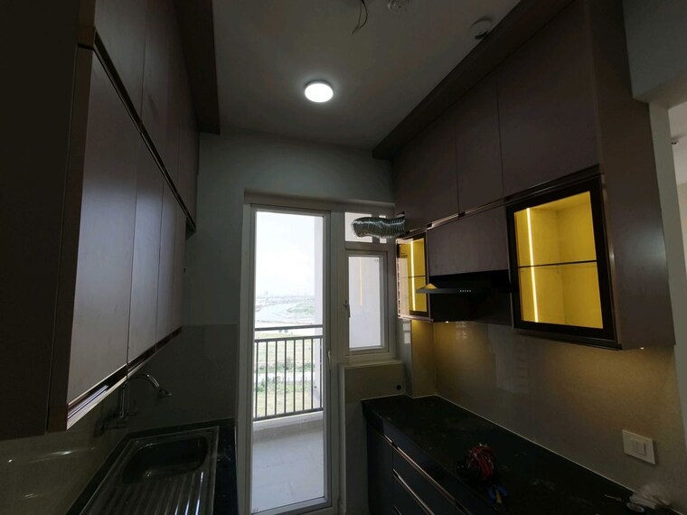 Kitchen, eldeco-live-by-the-greens 2 Bedroom 1137 Sq.Ft. Apartment In Sector 150 Noida 10371351
