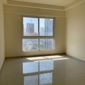 Room in 2 BHK Apartment at Rustomjee Summit, Datta Pada – for Rent