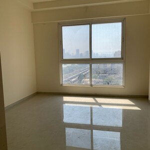 Room in 2 BHK Apartment at Rustomjee Summit, Datta Pada – for Rent