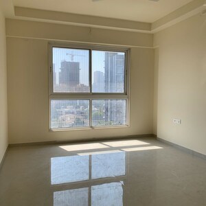 Room in 2 BHK Apartment at Rustomjee Summit, Datta Pada – for Rent