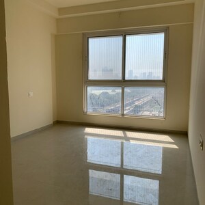 Room in 2 BHK Apartment at Rustomjee Summit, Datta Pada – for Rent