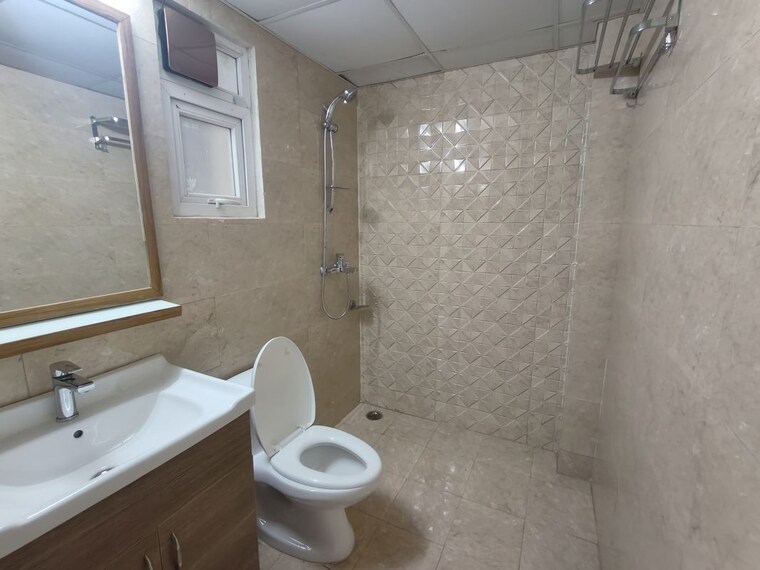 Bathroom, tulip-yellow 3 Bedroom 1850 Sq.Ft. Apartment In Sector 69 Gurgaon 10371427