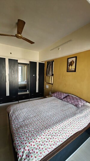 Bedroom in 3 BHK Apartment at Unique Twins Tower CHS, Kharghar Sector 20 – for Rent