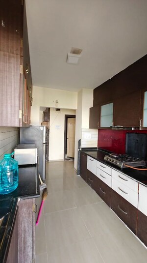 Kitchen in 3 BHK Apartment at Unique Twins Tower CHS, Kharghar Sector 20 – for Rent