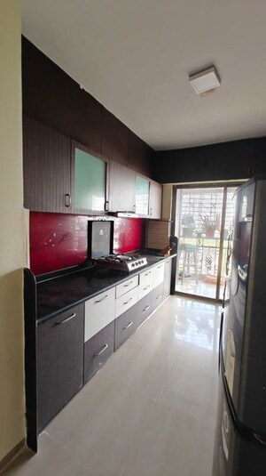 Kitchen in 3 BHK Apartment at Unique Twins Tower CHS, Kharghar Sector 20 – for Rent