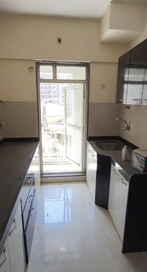 Kitchen in 2 BHK Apartment at JP North Estella, Mira Road – for Sale
