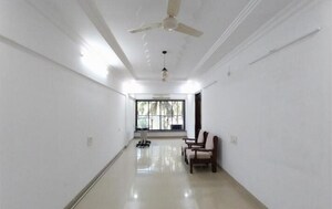 Living Room in 2 BHK Apartment at Juhu – for Rent