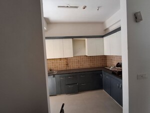 Kitchen in 3 BHK Apartment at Mahagun Mywoods III, Sector 16c Greater Noida – for Rent