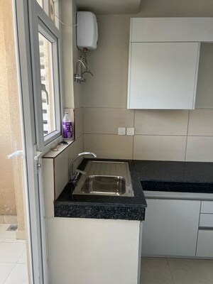 Kitchen in 2 BHK Apartment at Eldeco Live By The Greens, Sector 150 – for Rent