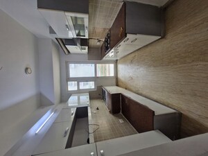 Kitchen in 4 BHK Apartment at Mahagun Moderne Low Rise, Sector 78 – for Rent