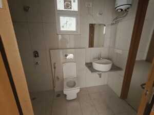Bathroom in 4 BHK Apartment at SS The Leaf, Sector 85 – for Sale