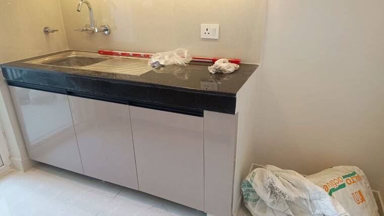 Kitchen, eldeco-live-by-the-greens 2 Bedroom 1137 Sq.Ft. Apartment In Sector 150 Noida 10371782