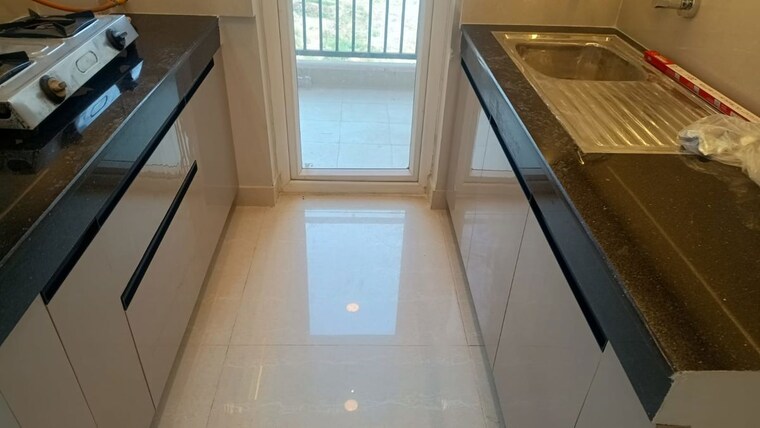 Kitchen, eldeco-live-by-the-greens 2 Bedroom 1137 Sq.Ft. Apartment In Sector 150 Noida 10371782